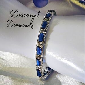 Blue Rectangular 5 mm Princess Cut Topaz Tennis Bracelet on 925 Silver